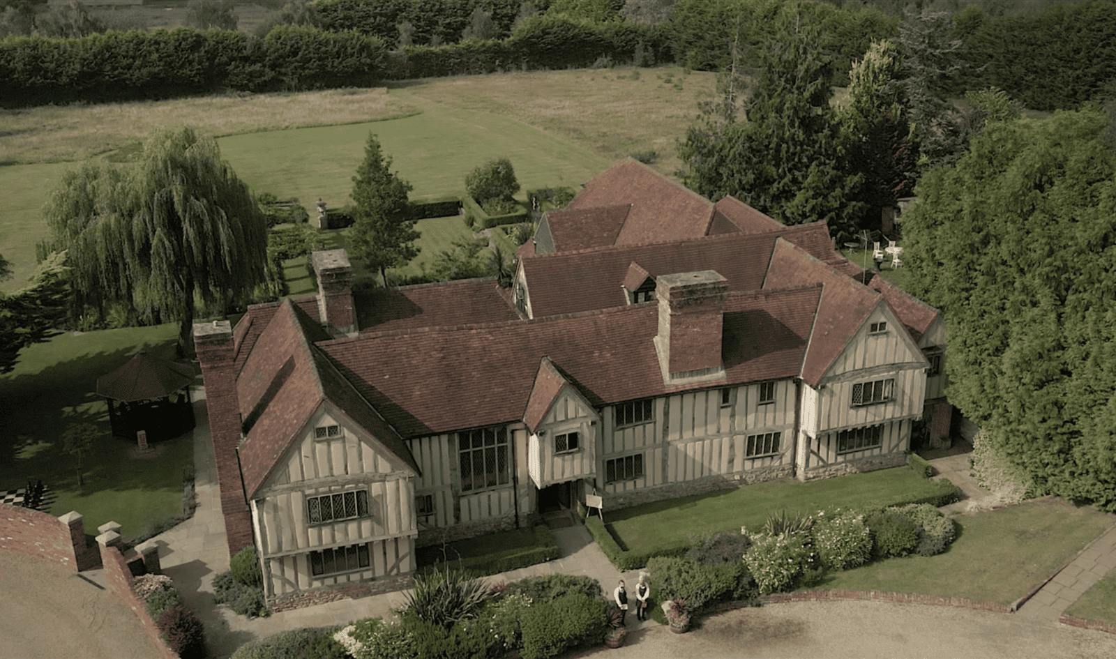 Aerial view of a manor house filmed for a property video tour
