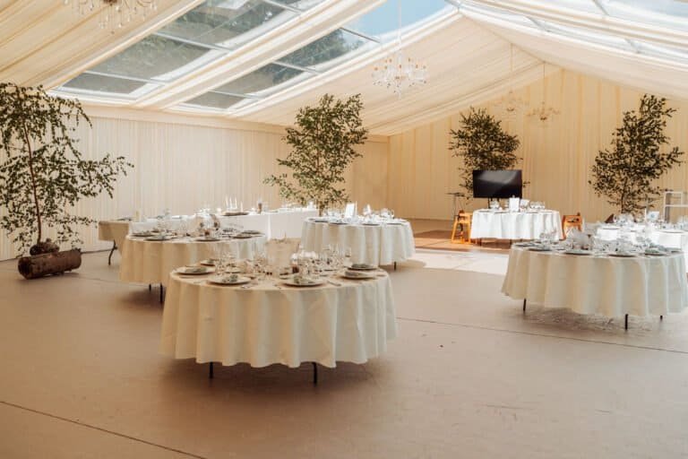 Marquee dressed for the wedding breakfast at Kingswood Manor