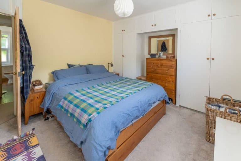 Double bedroom photographed for a property marketing tour
