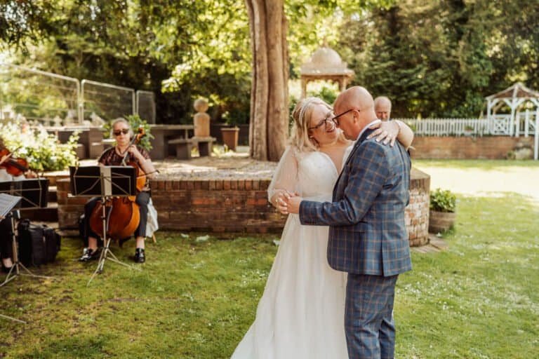 First dance in the garden with a live band playing behind